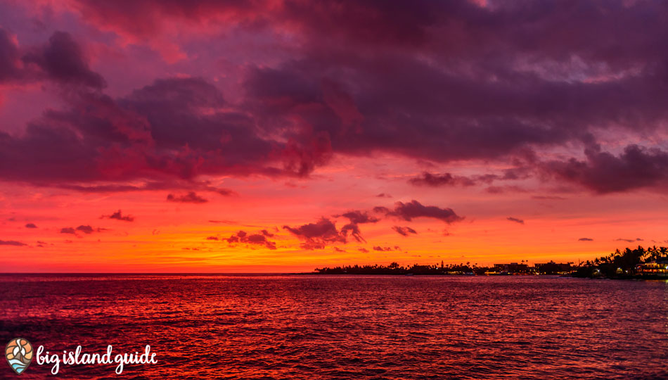 Colorful Sunset over Kailua Bay in Downtown Kona seen from Huggo's