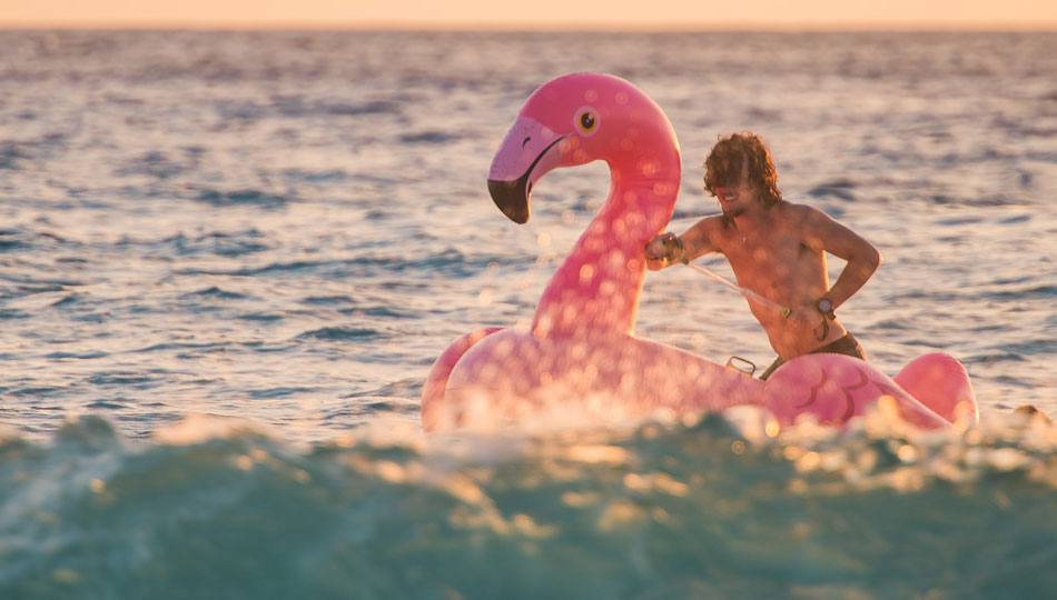 Pink Flamingo toy at Maniniowali Beach at Kua Bay