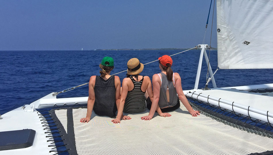 Paradise Sailing Catamaran - Girls Sitting on Front Net