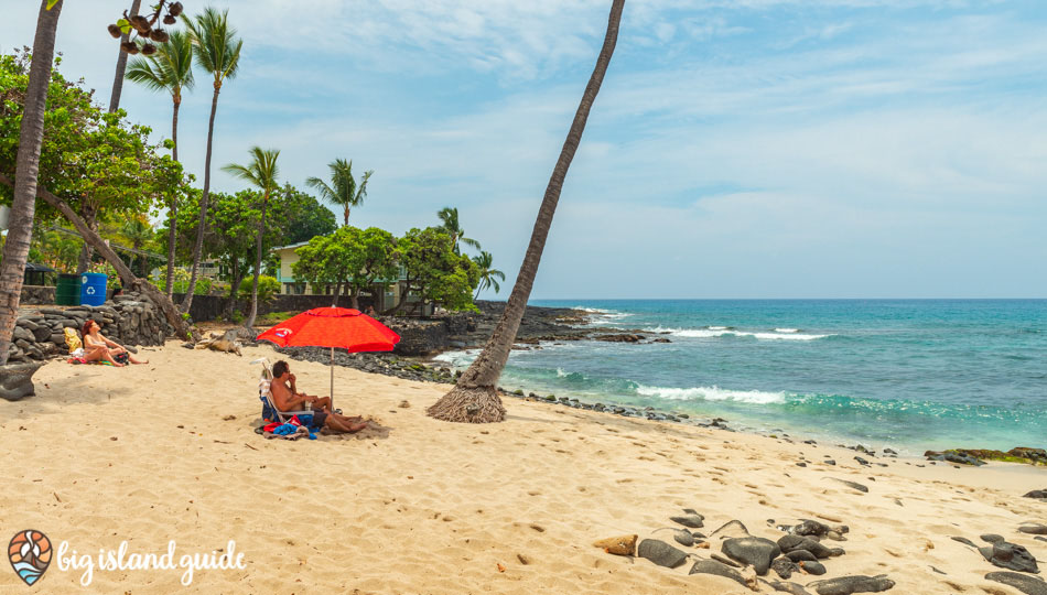 Beach Goers Under a Red Umbrella on Honl's Beach