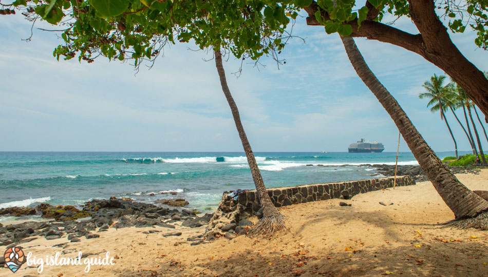 Honl's Beach with surfers, waves and a cruise ship in the background