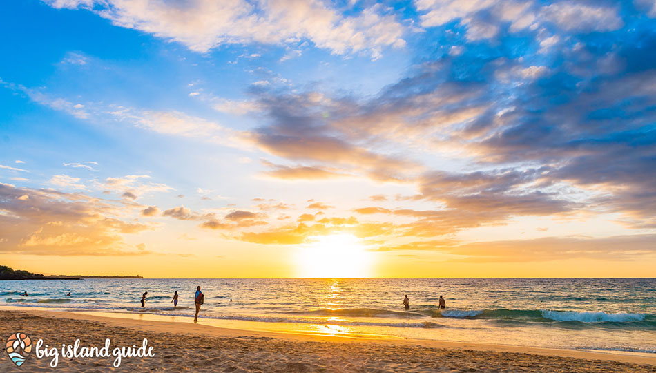 People Playing in the Waves at Sunset on Hapuna Beach