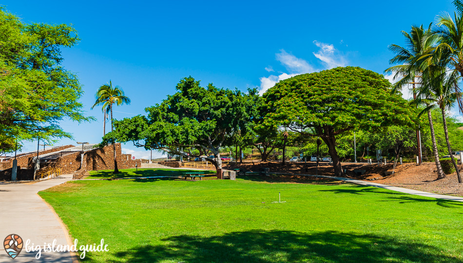 Spencer Beach Park Grassy Area, Picnic Tables, and Restrooms.