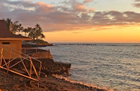 Kahaluu beach park lifeguard stand at sunset